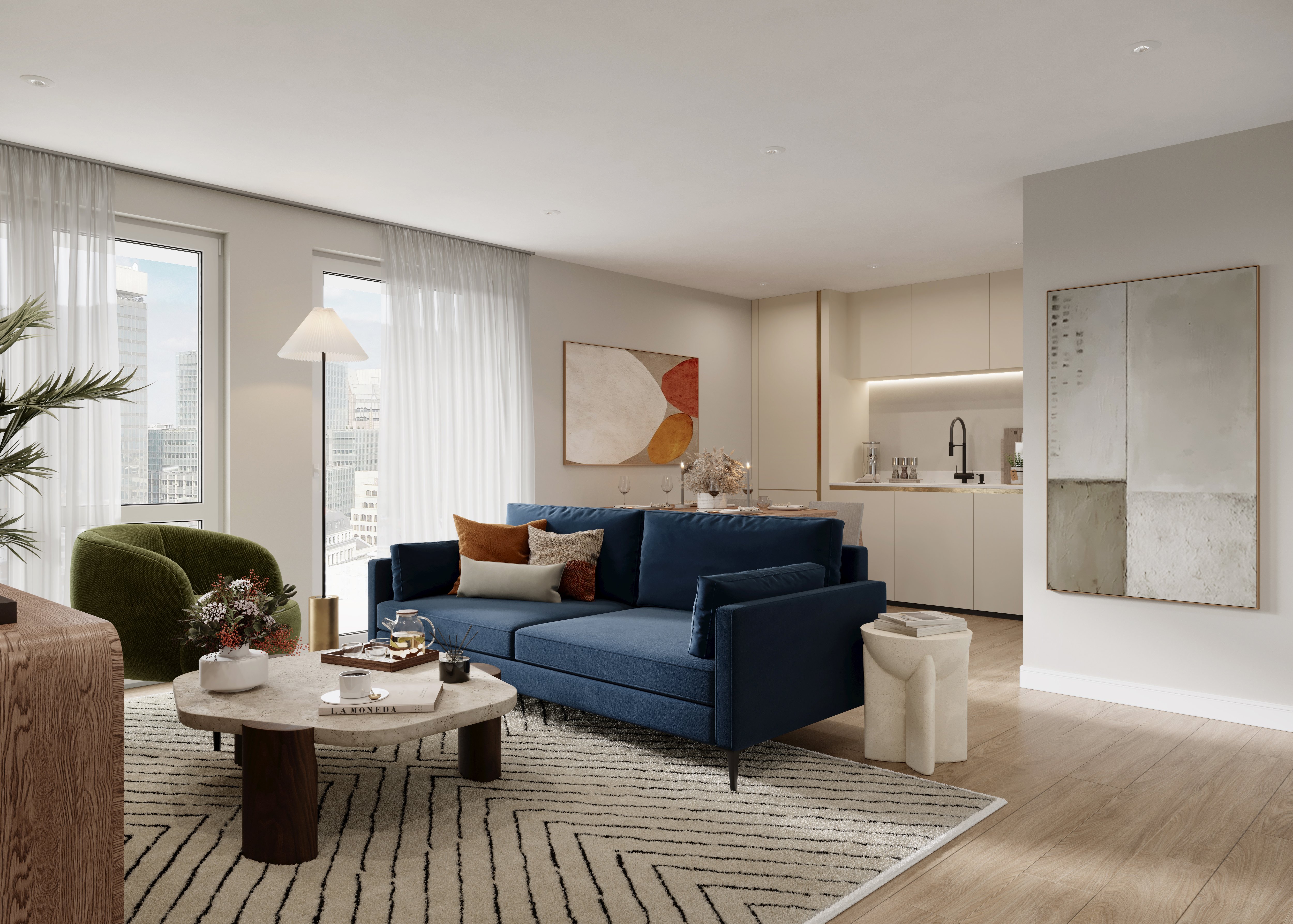 Luxury living room with sofa, coffee table and rug in neutral colour. Kitchen in the background. 